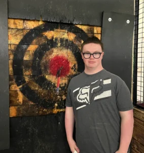 Indoor axe throwing, smash room, and mini golf for any event or celebration at North Plains entertainment venue.
