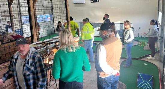 Indoor axe throwing, smash room, and mini golf for any event or celebration at North Plains entertainment venue.